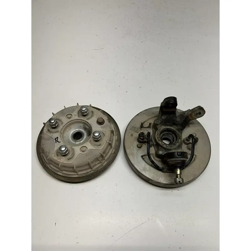 2002 02 Honda TRX500 FA2 4x4 Foreman Rubicon GOOD Right Hub Spindle Brake Plate